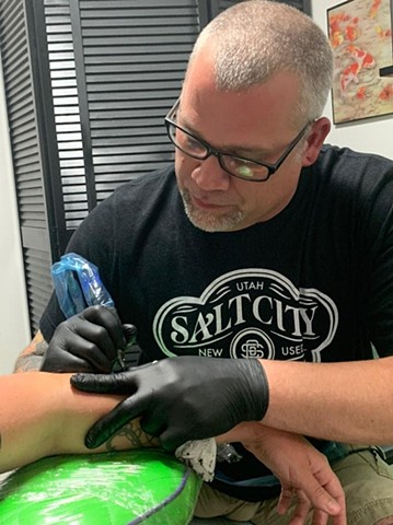 Professional Tattoo Artist / Body Piercer Michael Hand