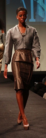 photo of model wearing silk/wool, tucked jacket and pin-tucked silk organza skirt designed by sarah buck mueller