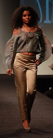 photo of model wearing silk butterfly top and silk/wool tuxedo pants designed by sarah buck mueller