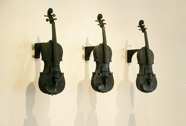 Charred violins and sound provided by Mp3 electronics