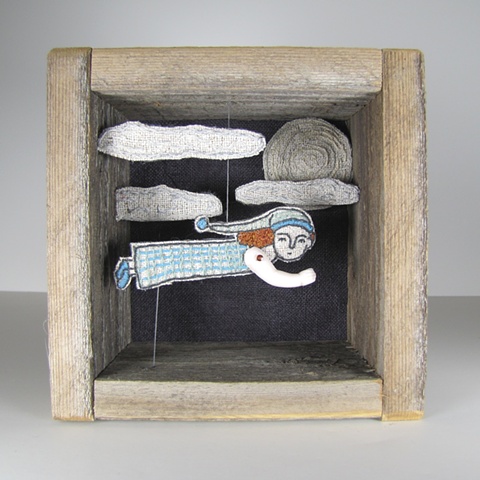 Hand embroidered diorama using antique and reclaimed materials.