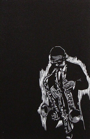 relief engraving of jazz musician roland kirk playing 3 horns