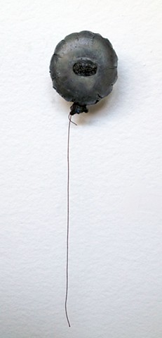 Cast glass balloon with teeth. Surrealist. Contemporary Art. Glass narrative. Storytelling.  Surrealism.