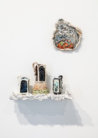 Ceramic Arrangement. (Scribble palette, glitter shakers and pedestals, on decorated shelf.)