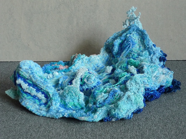 Chenille stem sculpture of cascading water, part of the movement of water series.