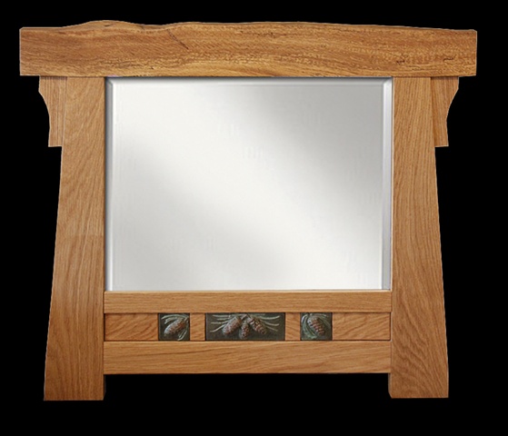 Arts & Crafts style beveled mirror with spalted oak top piece and glazed terra-cotta tiles in pine cone pattern.