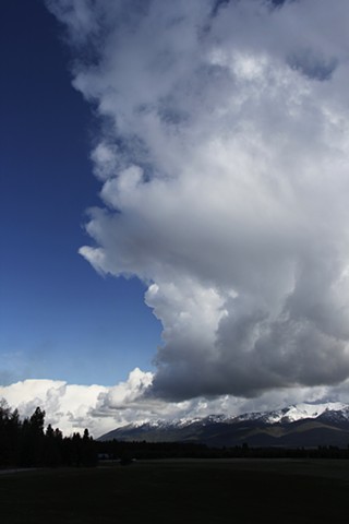 Late April cloud formations over the Swan Mountains in Flathead County Montana.