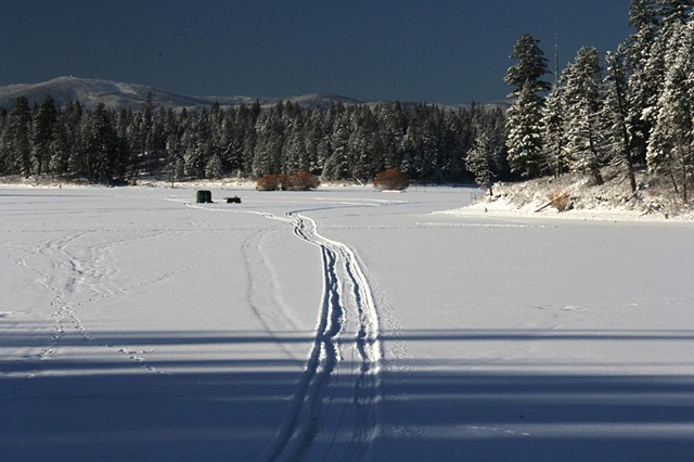 A lone ice fisherman on Echo Lake in northwestern Montana.