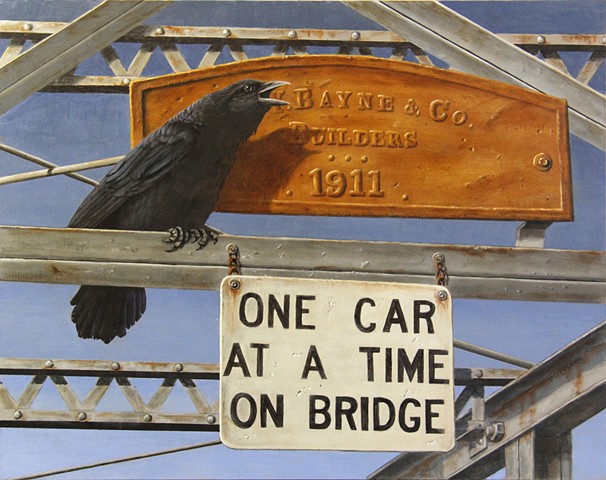A civic minded crow helps direct traffic across the Swan River in Bigfork, Montana.