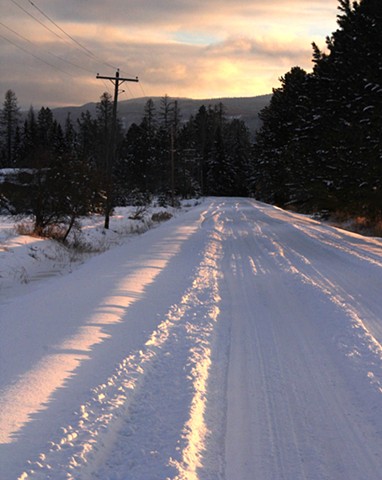 An early January dusk paints Wolf Creek Road in northwestern Montana.