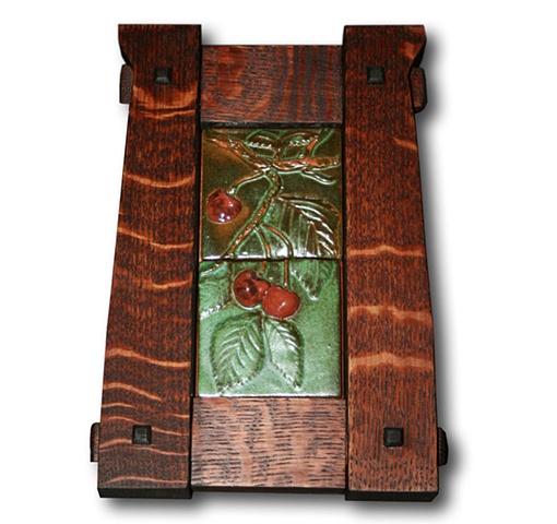 Hand-carved ceramic tile plaque featuring an image of sweet cherries from the shores of Montana's Flathead Lake