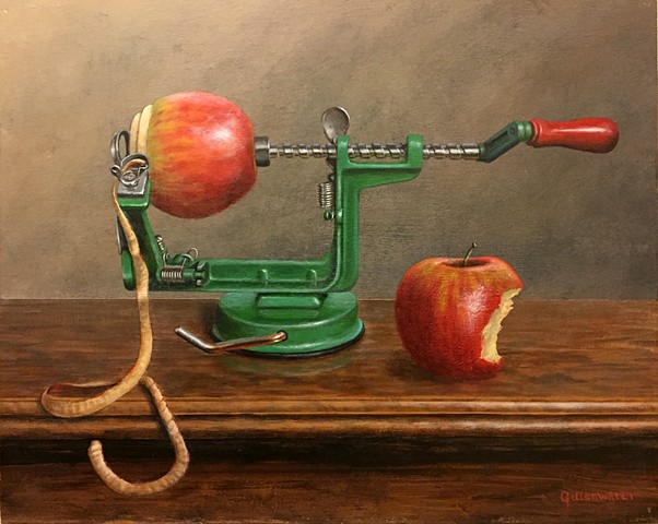 Still-life of an old-fashioned apple peeler awaiting completion of its appointed task.
