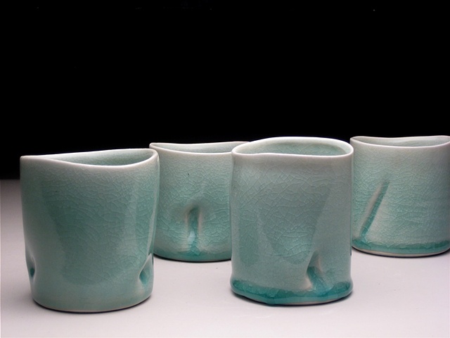 wheel thrown and altered celadon cups