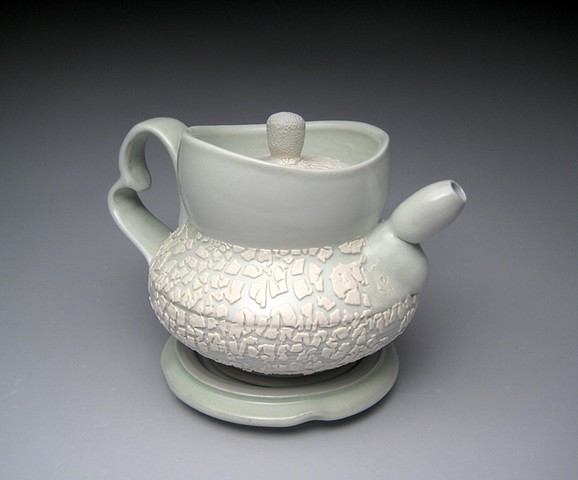 thrown and altered porcelain, celadon glaze, white crawl glaze, teapot,