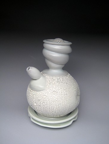 thrown and altered porcelain, celadon glaze, white crawl glaze, bottle,