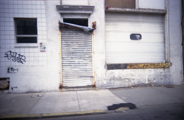color photograph of receiving gate and graffiti in boston, ma by iris grimm