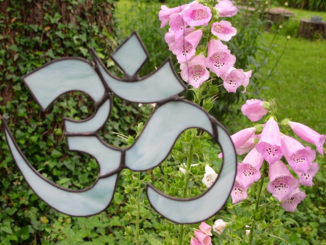om symbol stained glass