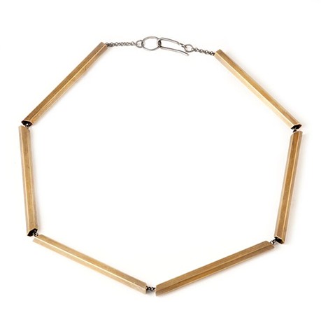 Modern tube necklace made from brass hexagon tubes and silver chain