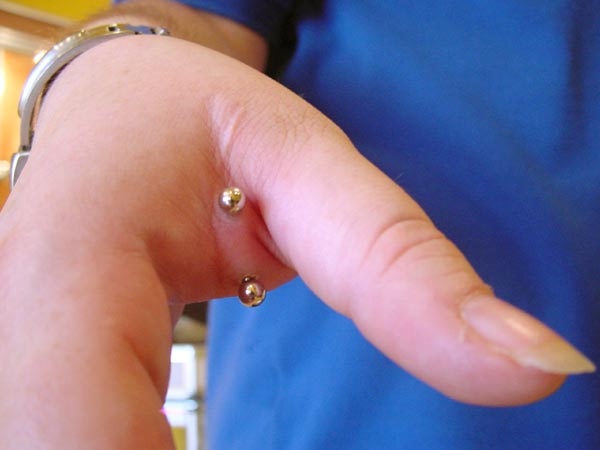 hand surface piercing by tatupaul