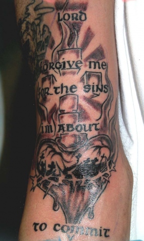 religious lord forgive tattoo by tatupaul