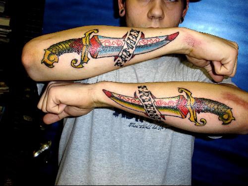 traditioanal american dagger tattoo by tatupaul
