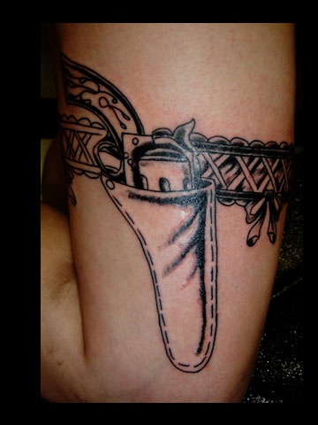 pistol  tattoo by tatupaul
