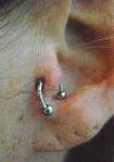 ear piercing by tatupaul