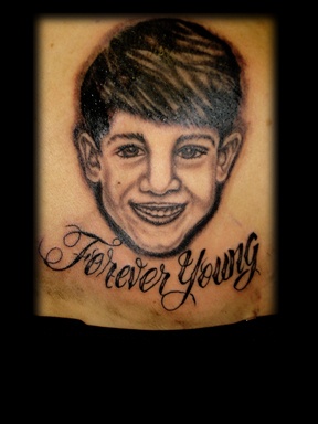 portrait of boy tattoo by tatupaul