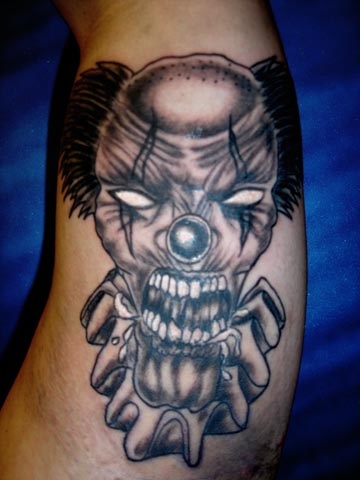clown tattoo by tatupaul