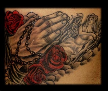 praying hands tattoo by tatupaul.com