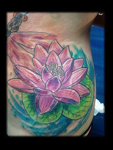 lotus float tattoo by tatupaul.com