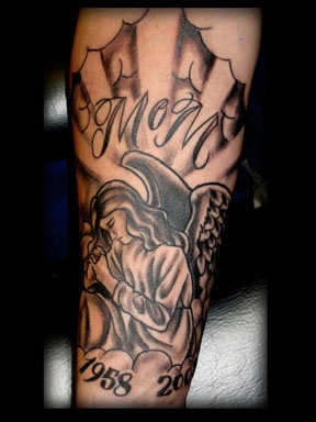 angel religious  tattoo by tatupaul