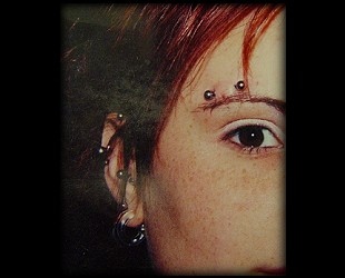 eyeebrow piercing by tatupaul