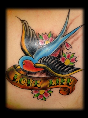 traditional swallows tattoo by tatupaul