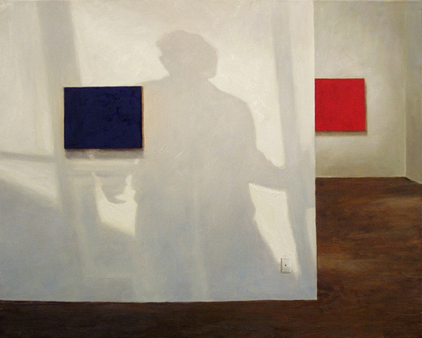 Interior of gallery with minimalist paintings, human shadow on  white walls.