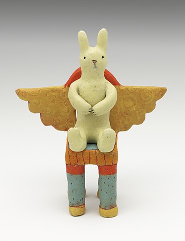ceramic figure rabbit wings chair by Sara Swink