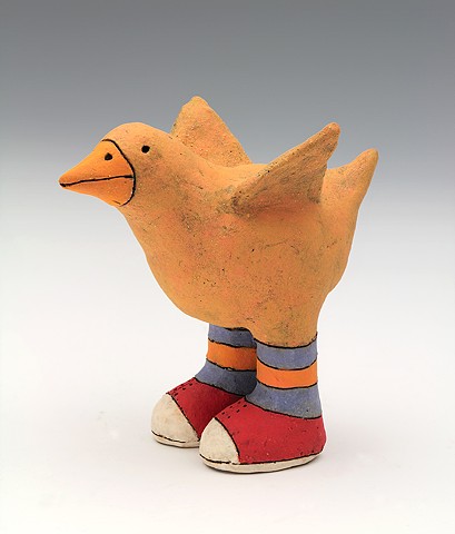ceramic figure animal bird tennies yellow orange pottery by Sara Swink