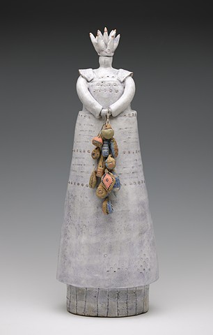 Crowned Figure with Beads