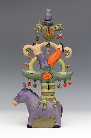 ceramic figure with animals by Sara Swink