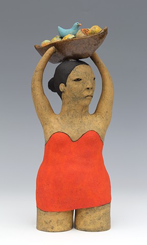 clay ceramic figure with fruit and bird by sara swink