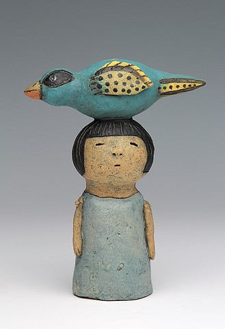 ceramic figure with bird by Sara Swink