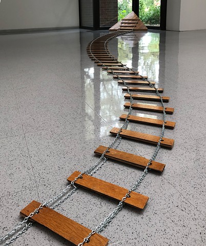 Heather Brammeier installation art reclaimed materials oak flooring chain