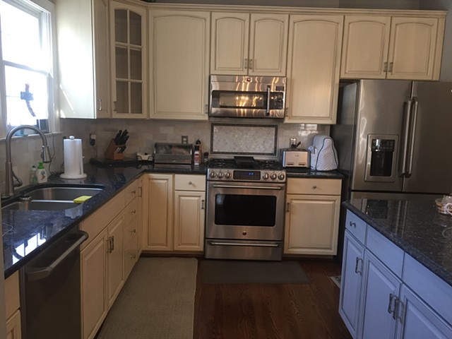Cream and gray cabinets with steel glaze 