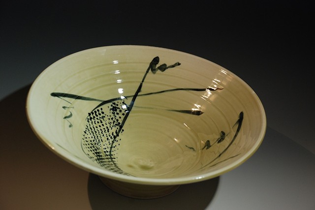 Celedon bowl with slip trail design