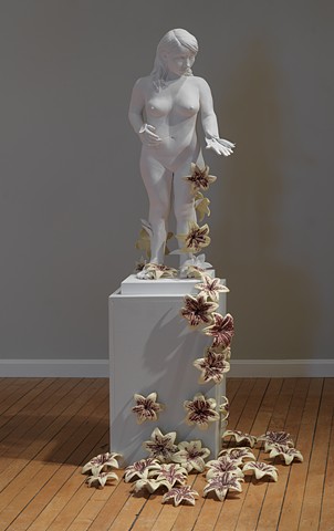 installation with ceramic and mixed media figure with lilies by leigh craven