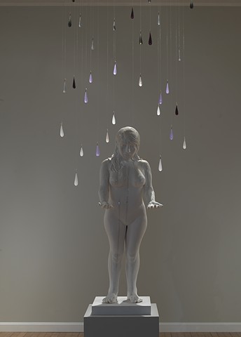 installation with ceramic and mixed media figure with cast glass raindrops by leigh craven