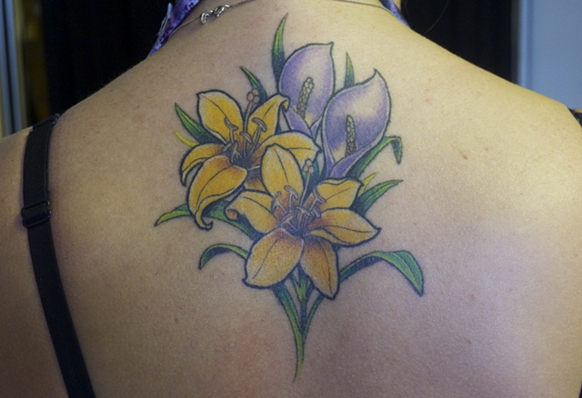 Lily flower tattoo by J. Majury
