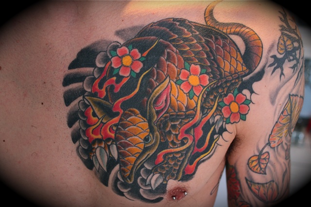 armadillo with blossoms tattoo