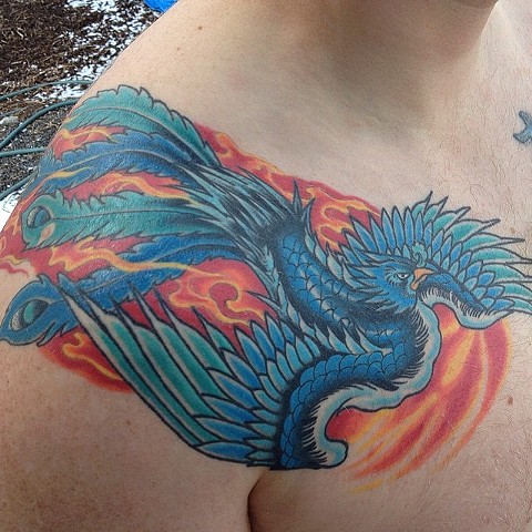 healed phoenix tattoo