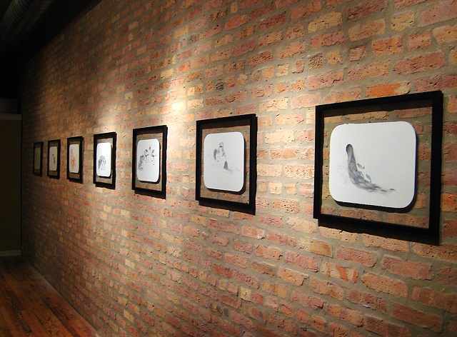 Photo of Jenny Kender's solo show, Cohabit, at the COOP - showing her drawings on the wall